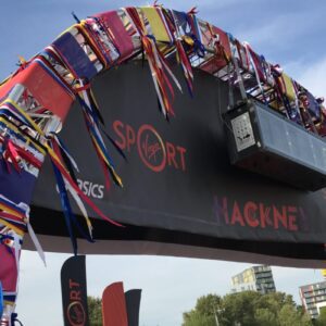 Truss welcome arch on concrete bases at the Hackney Half Marathon